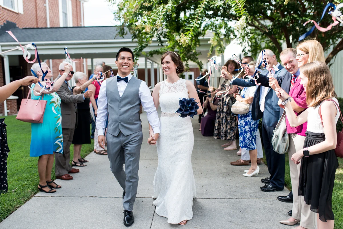 Joy-Filled Wedding with Rose Gold Details | Wedding Streamer Exit