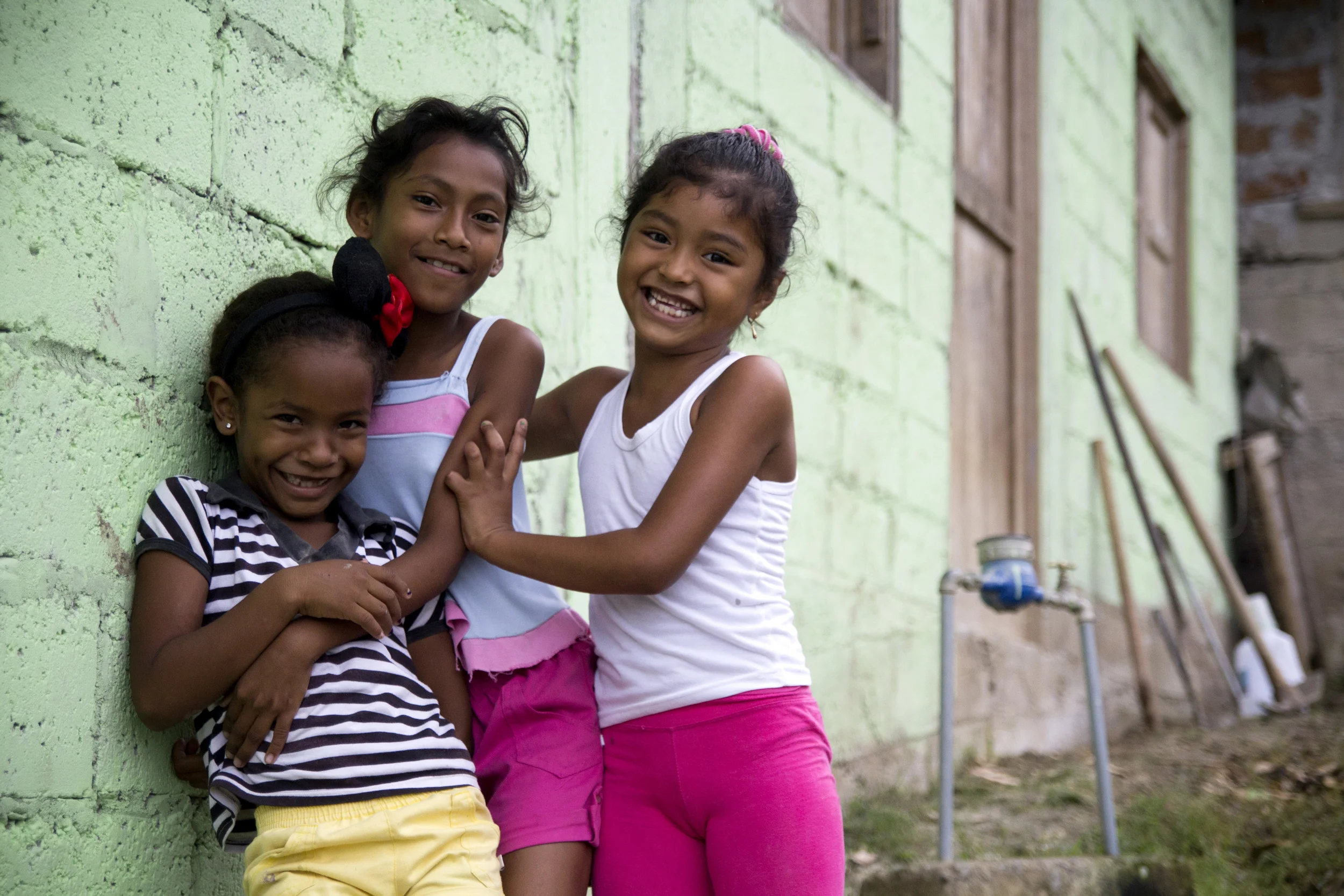 Girls laughing in Esmeraldas, Ecuador. I came here for a week as part of my internship with the NGO.