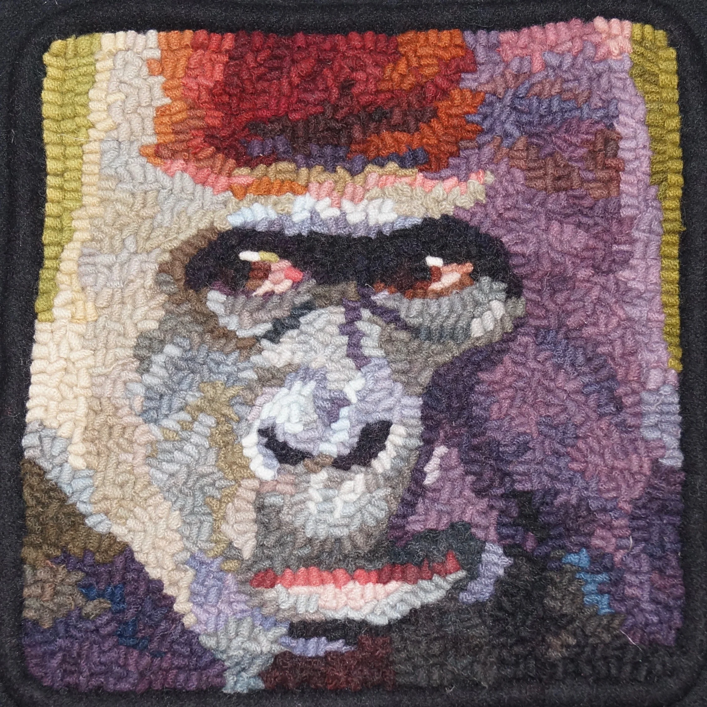 Gorilla 2019. 6-cut wool on linen. Designed, Dyed, and Hooked by April D. Deconick.