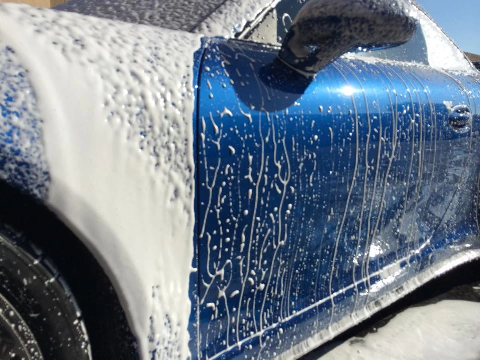 Left: non coated surface vs Right: Glass coated surface on a Porsche GT3. Extreme Hydrophobic properties where dirt, tar, and soap do not stick to the surface.