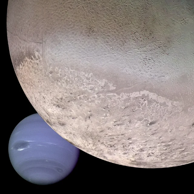 Computer enhanced composite Image of Neptune and Triton courtesy of NASA