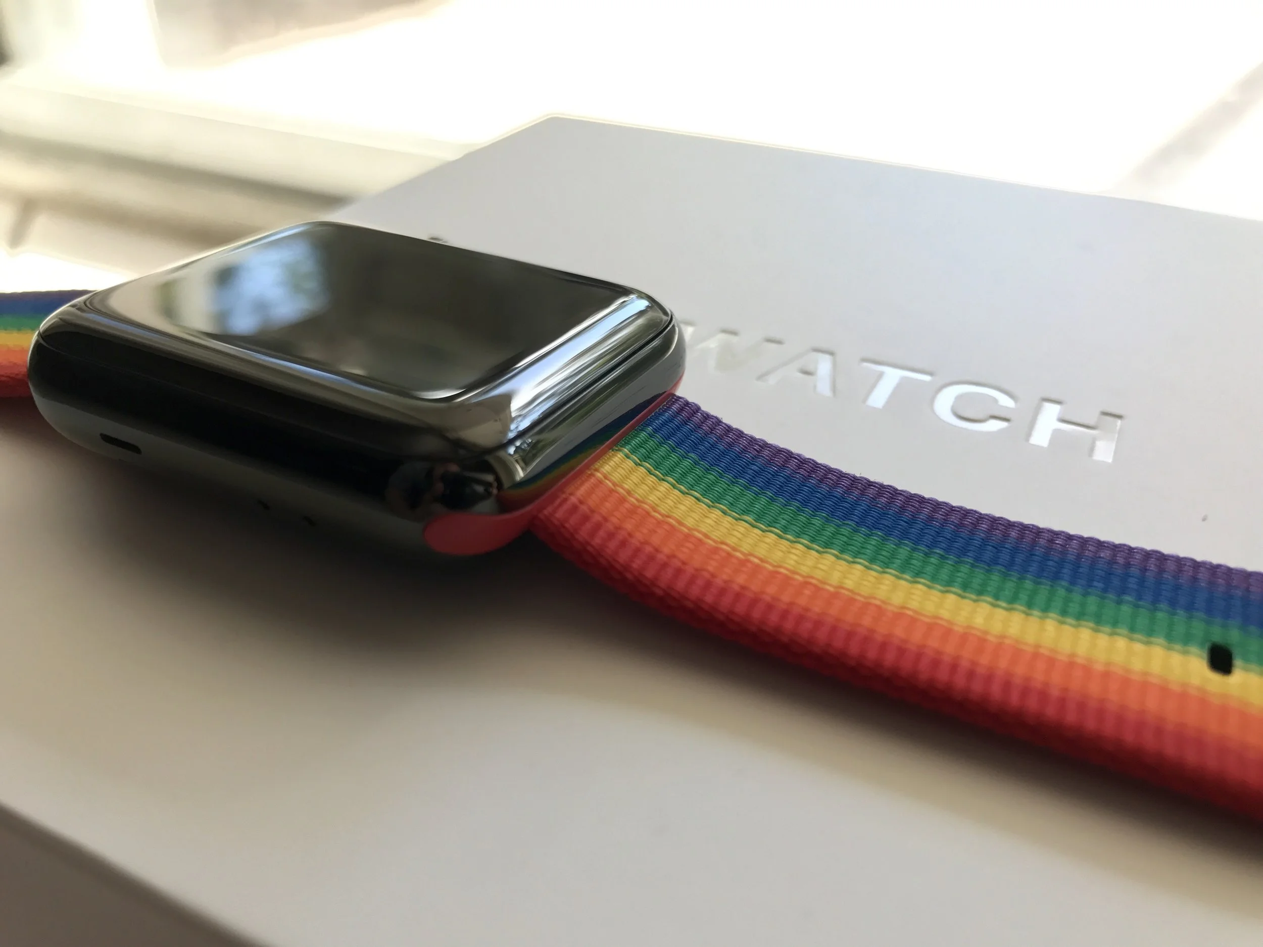 And last but not least...the "Pride" band really pops with color against the black stainless steel case