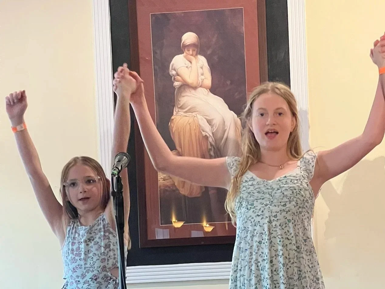 Middle School Voice Class students taking a bow at the 2025 Cabaret performance