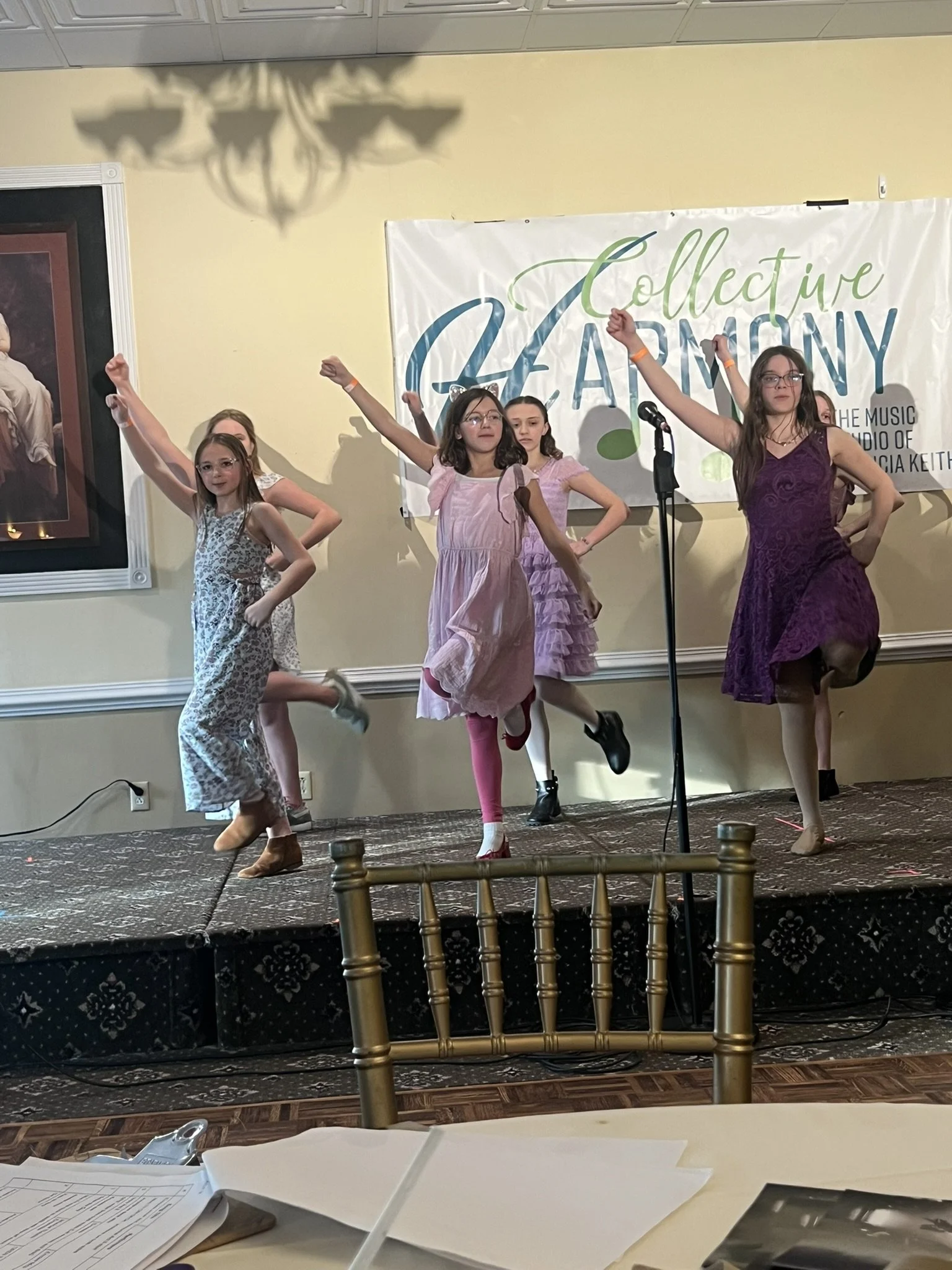 A group of students performing on stage at our annual Cabaret performance.