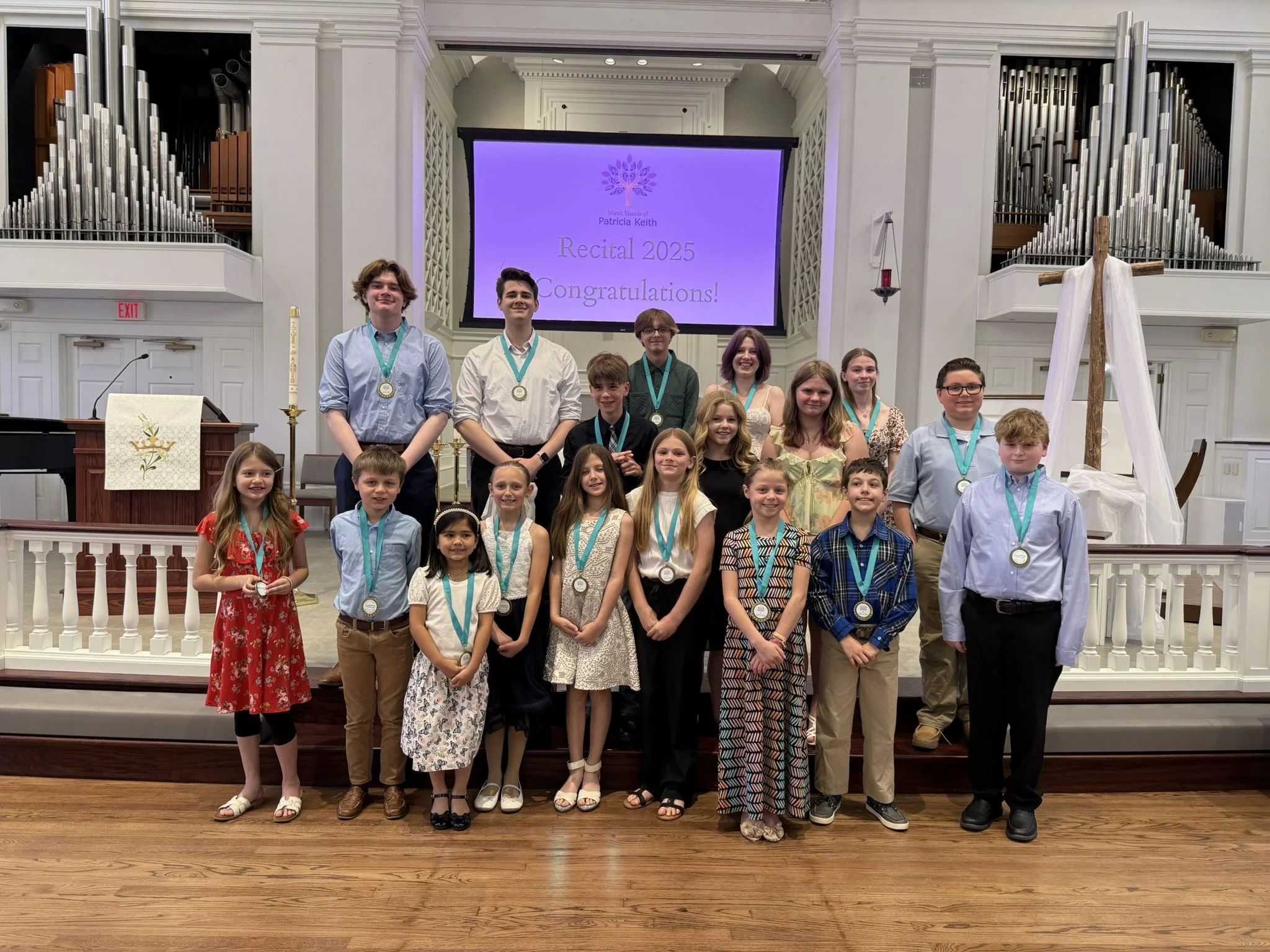 A group of students with medals at the Spring Recital of the Music Studio of Patricia Keith, Boyertown PA