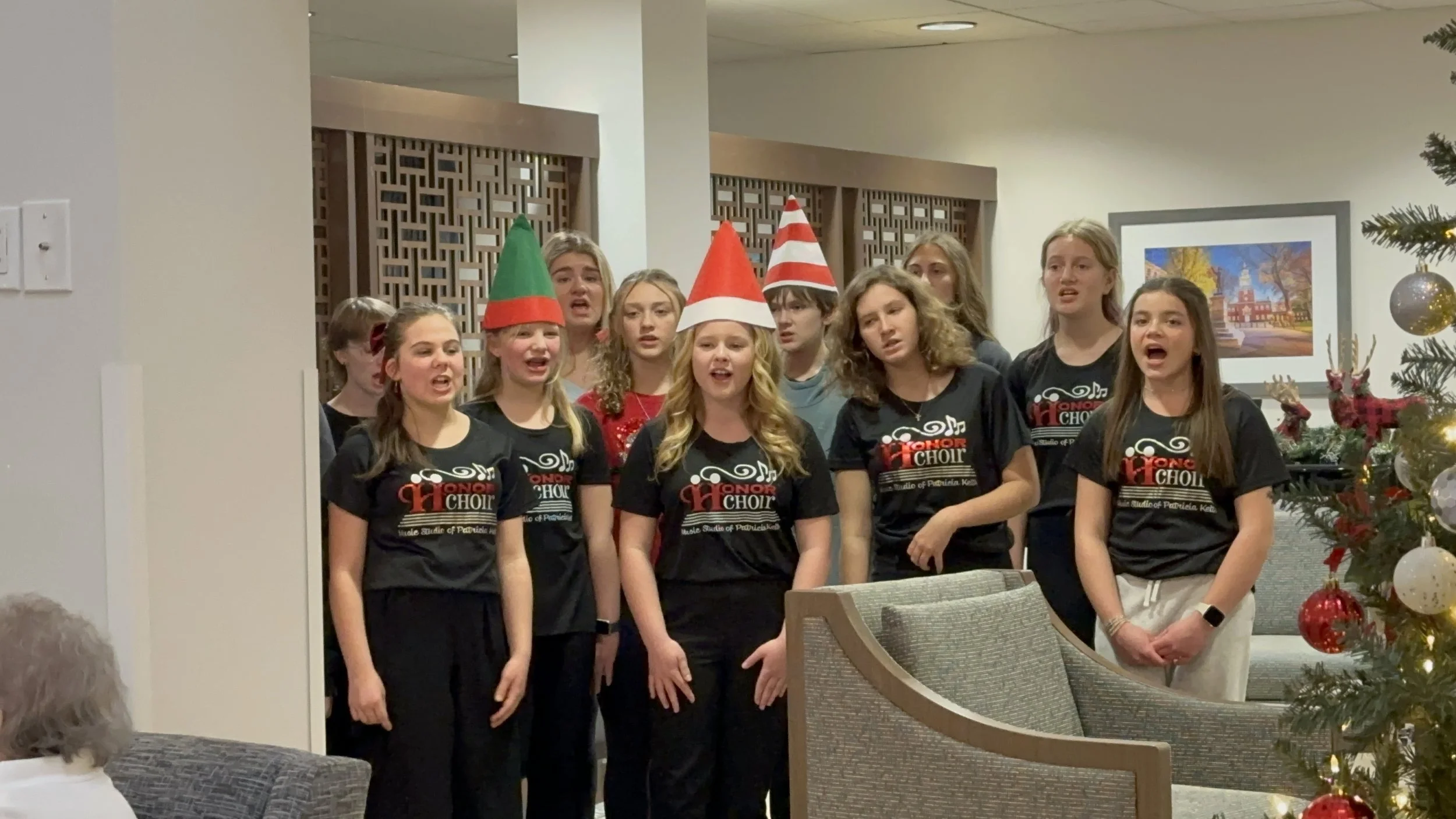 Honor Choir students caroling in the community