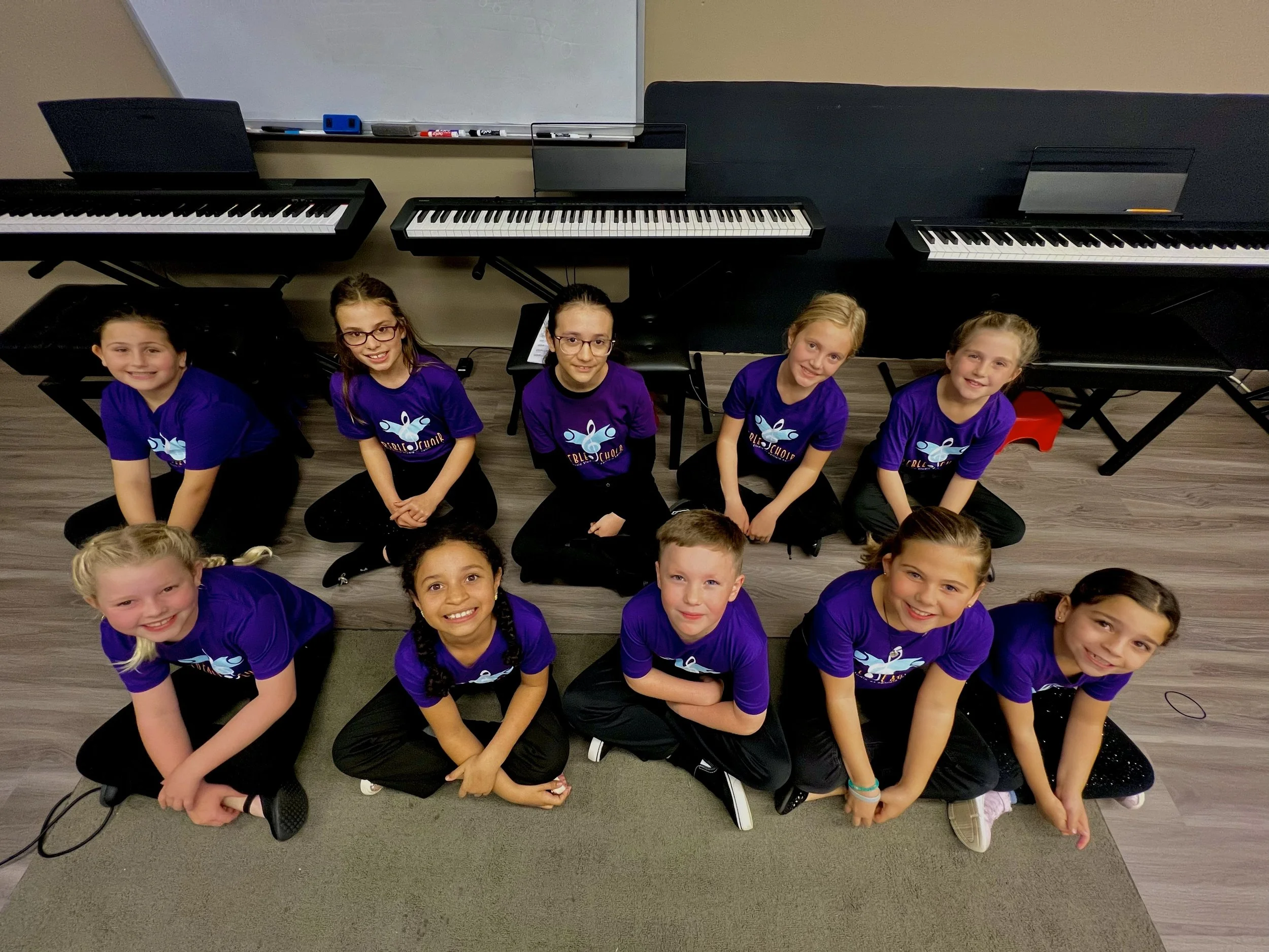 Treble Choir students in choir shirts at Music Studio of Patricia Keith