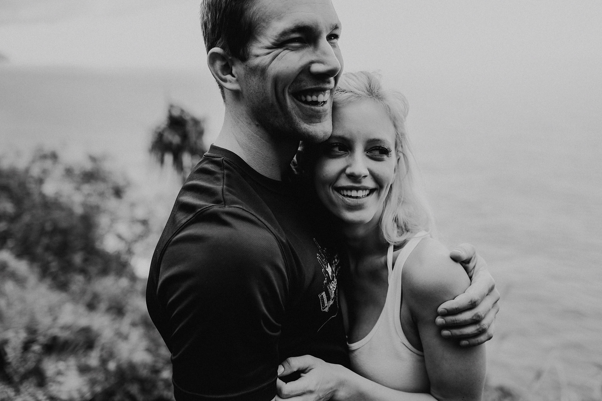 hawaii kauai elopement na pali coast mountain hike bride groom laughing photo
