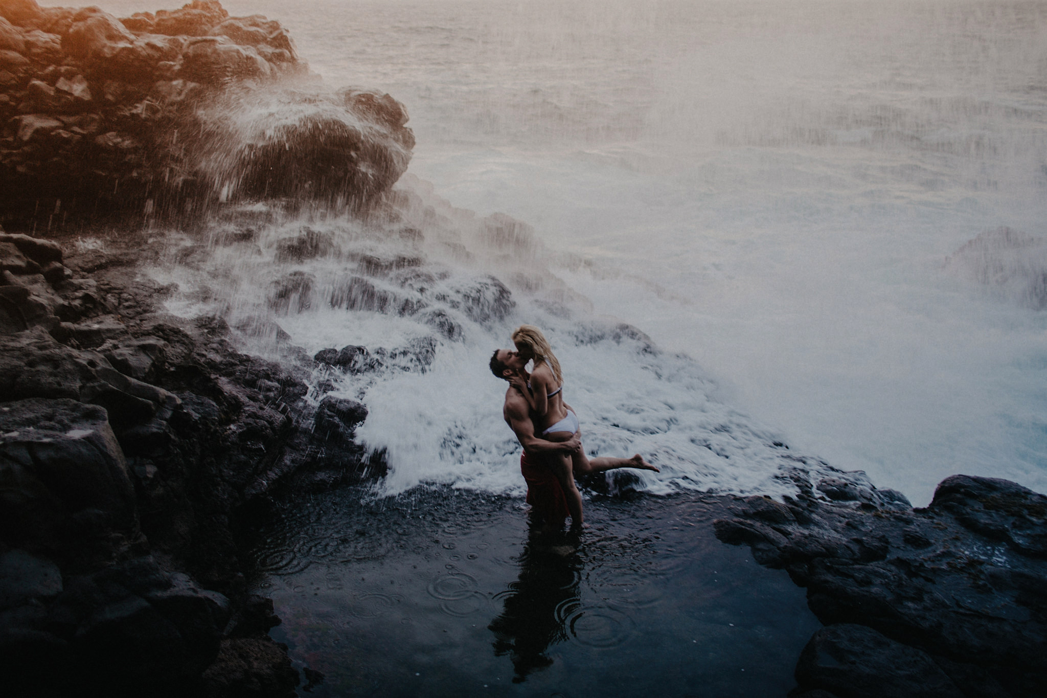 hawaii kauai elopement queens bath sunset bride groom ocean wave tidepool splash photo