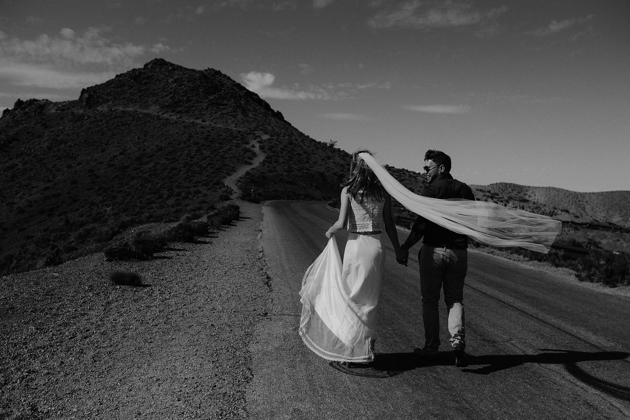 death valley adventure elopement wedding photographer national park couple walking portrait