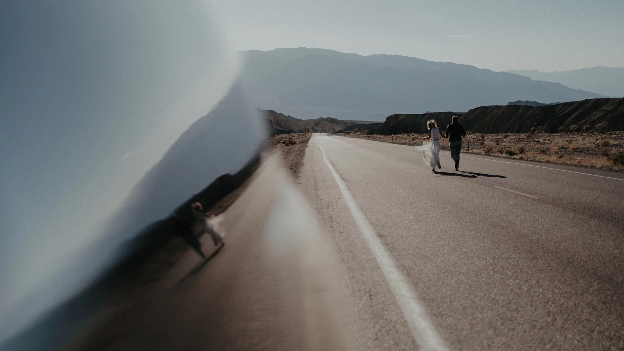 death valley adventure elopement wedding photographer national park couple running portrait photo
