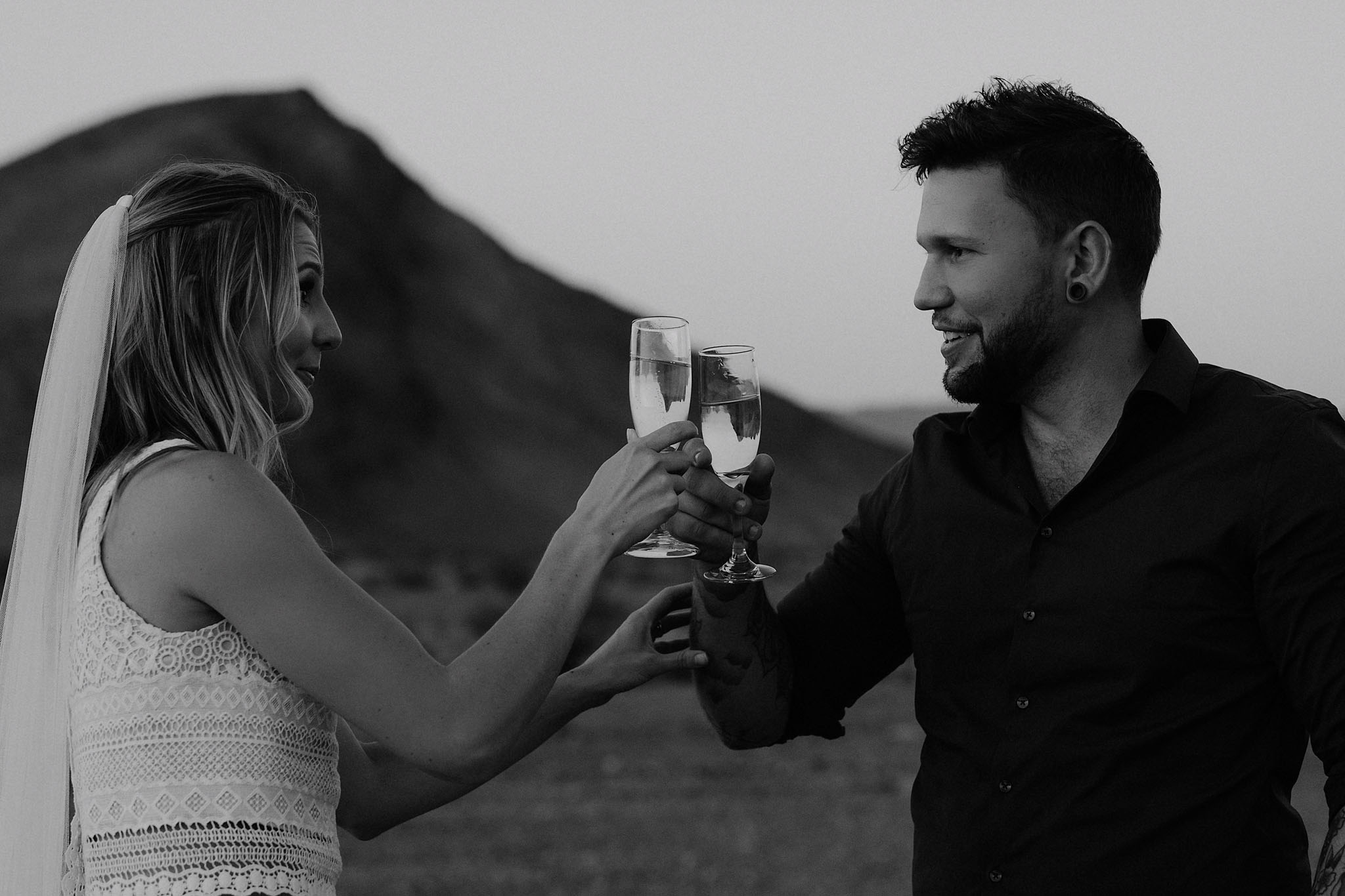 death valley adventure elopement wedding photographer national park couple sunset portrait champagne