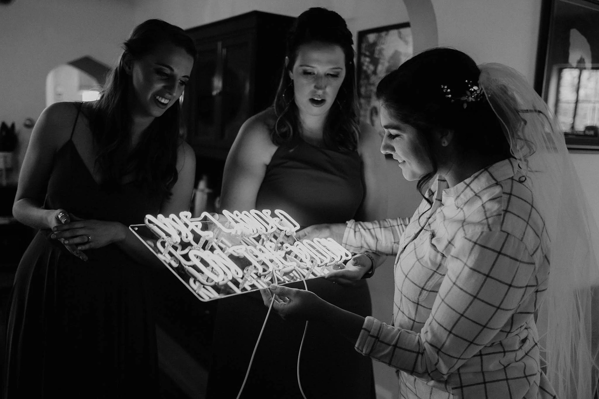 cincinnati warehouse wedding photographer bride neon sign