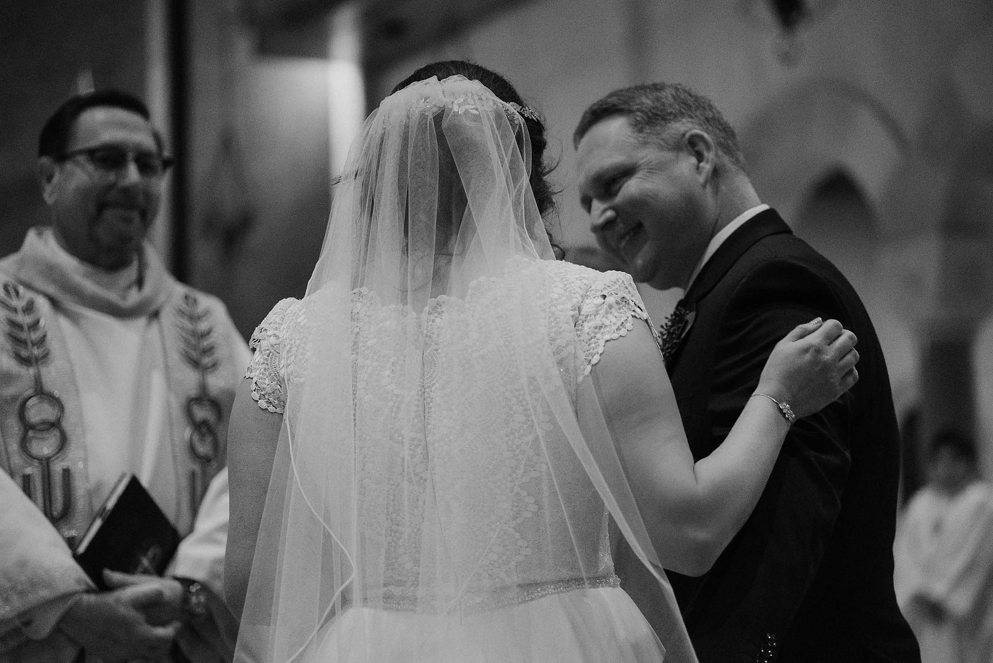 cincinnati warehouse wedding photographer cathedral church ceremony father smiling