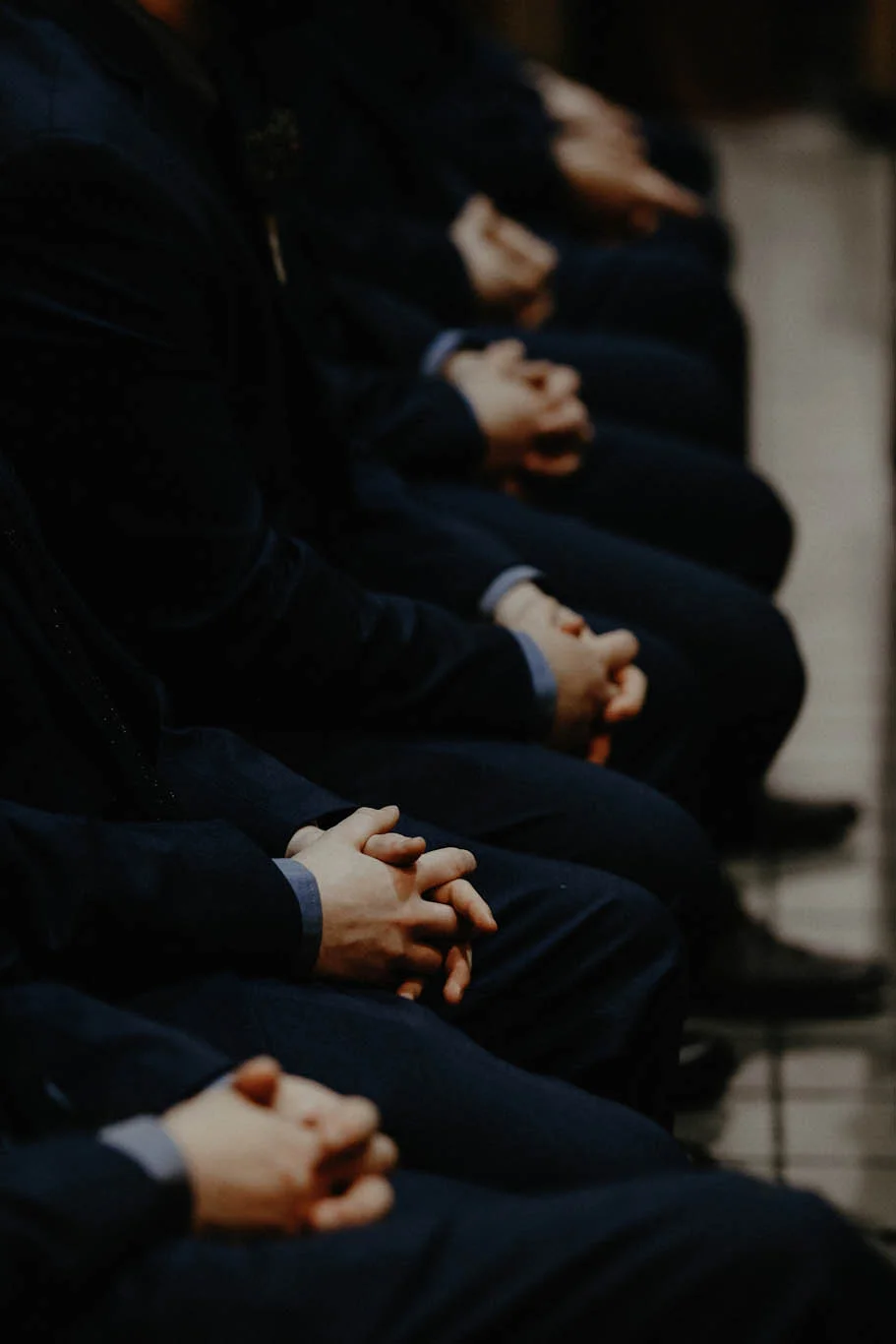 cincinnati warehouse wedding photographer cathedral church ceremony groomsmen hands