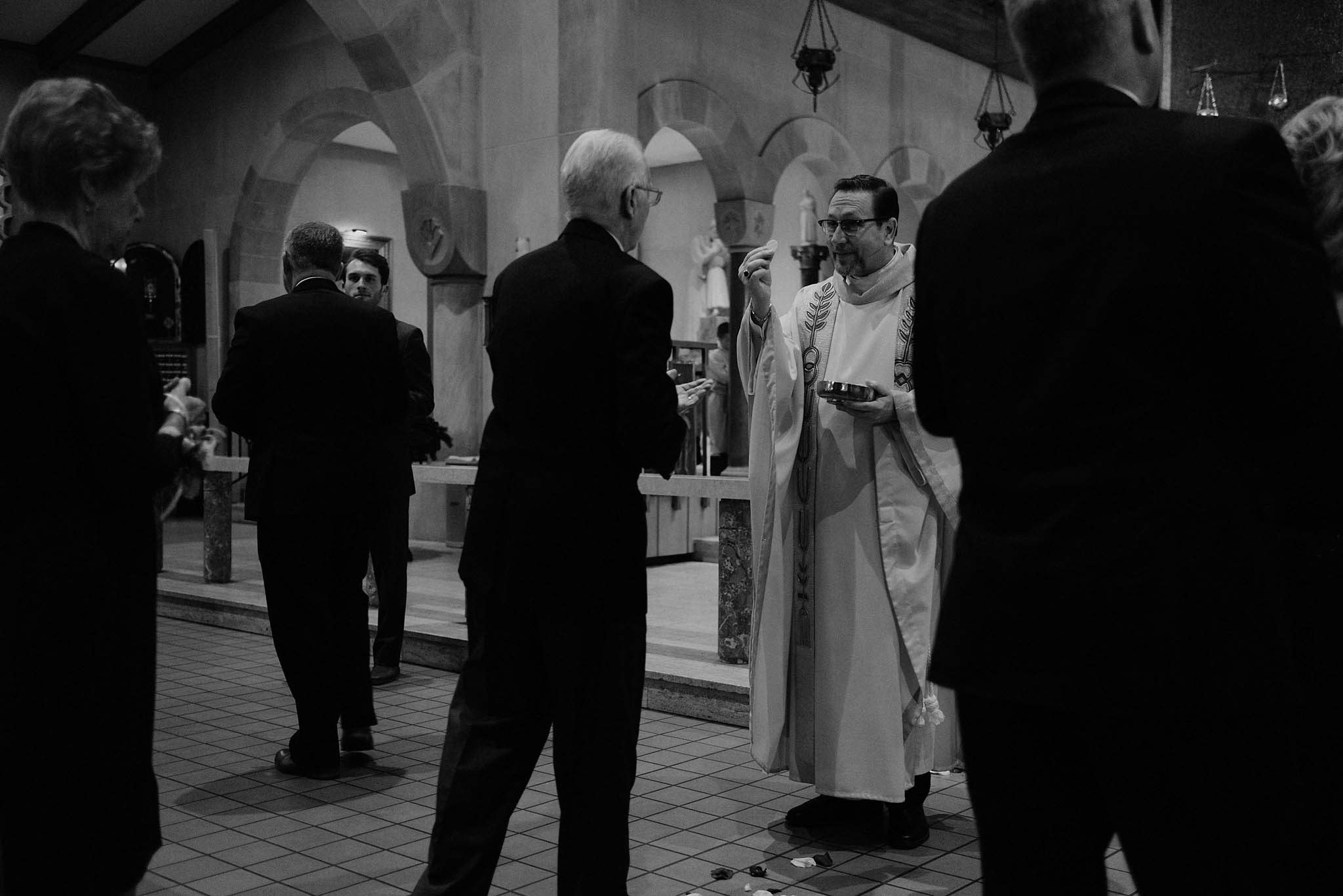 cincinnati warehouse wedding photographer cathedral church ceremony communion