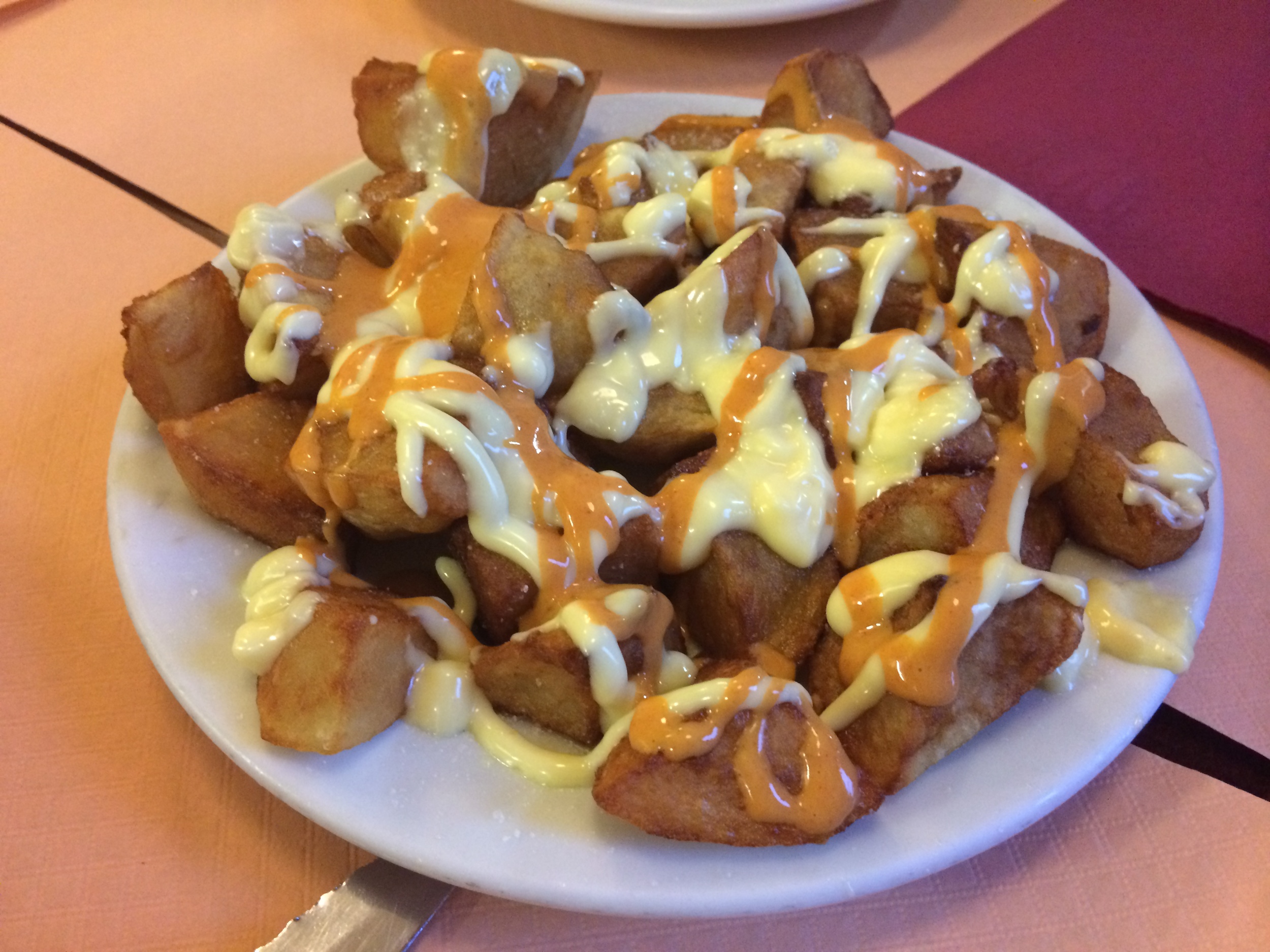 Papas Bravas, a local dish of fried potatoes in aioli-like sauce.