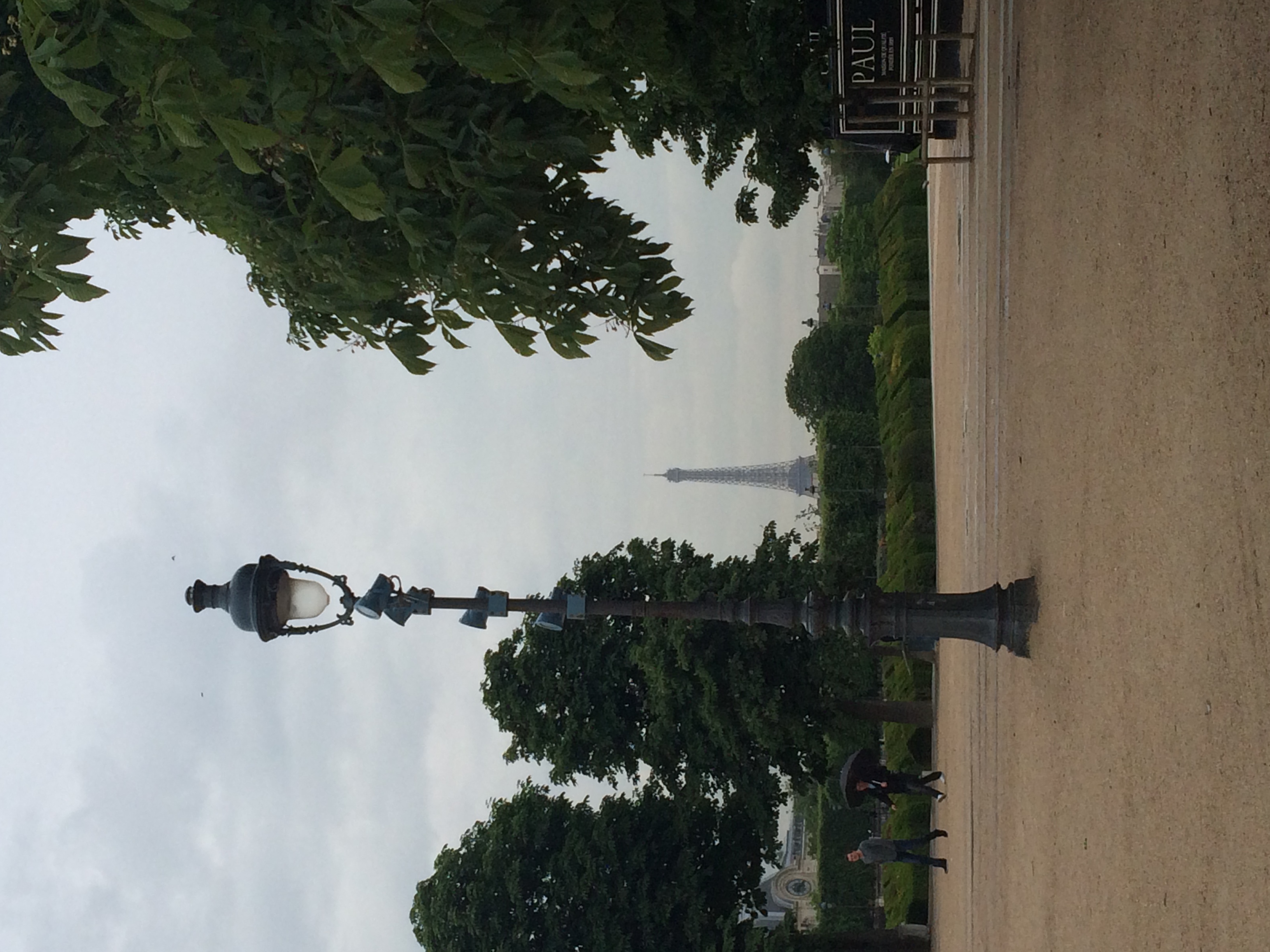 At the Louvre, with the Eiffel Tower in the distance.