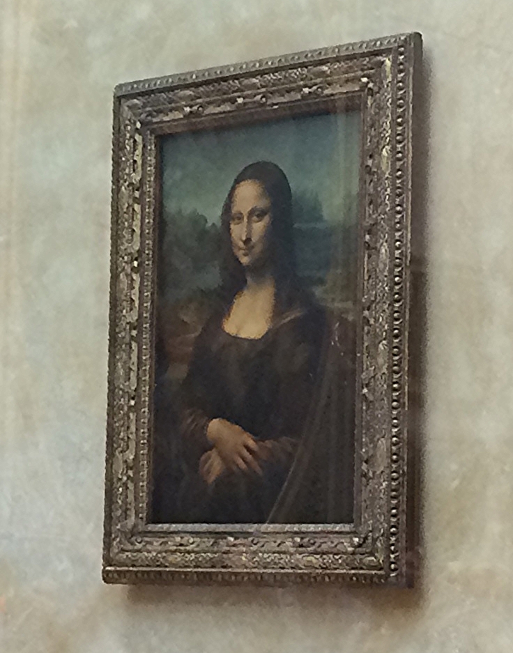 The Mona Lisa. It is encased in a glass security tomb that, in case of an emergency, will sink the priceless painting into a basement vault to keep it safe. Our tour guide told us that no insurance company is willing to insure this painting--it is too great a risk as it is literally priceless.
