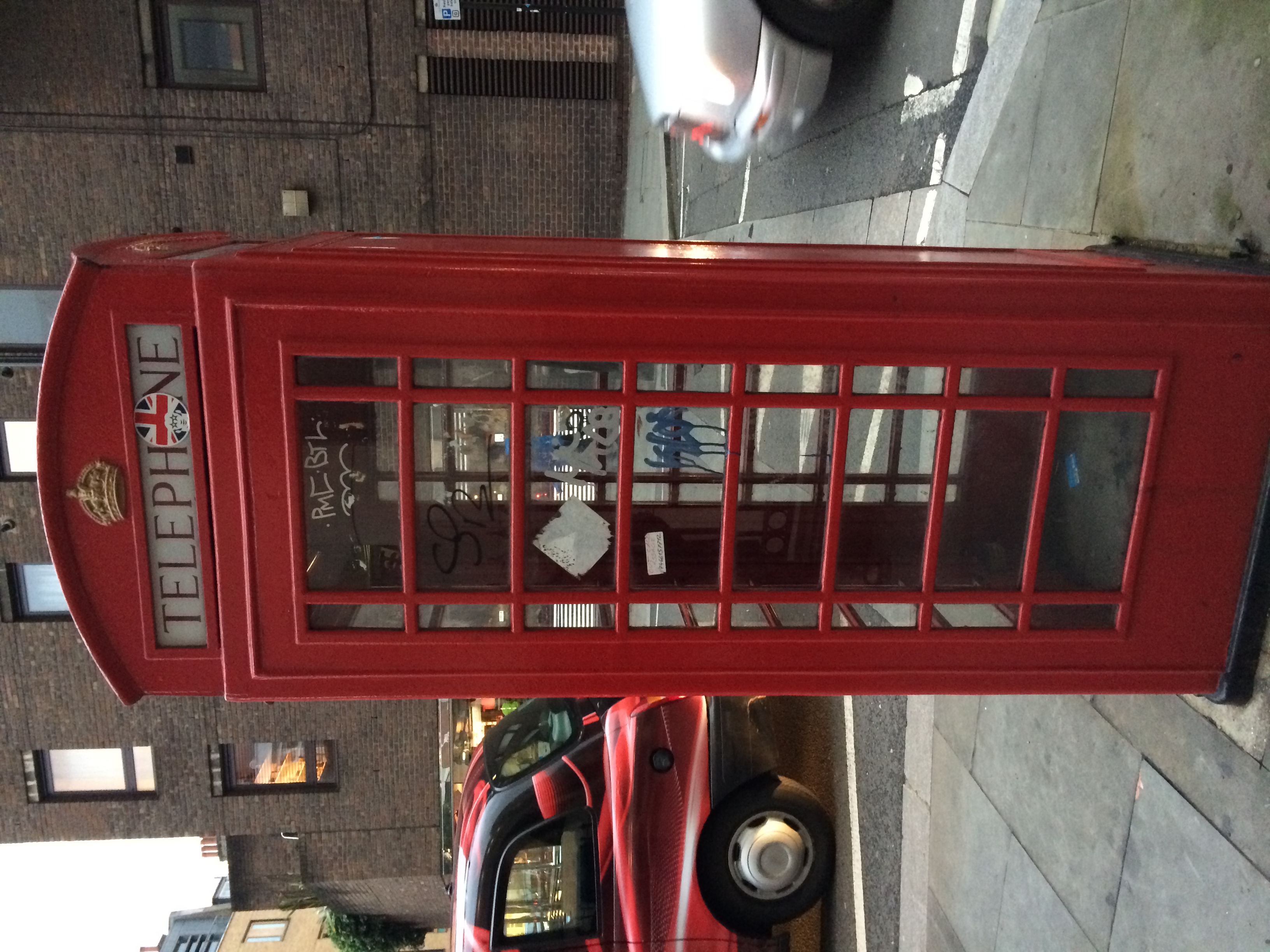This iconic London telephone booth, complete with graffiti!