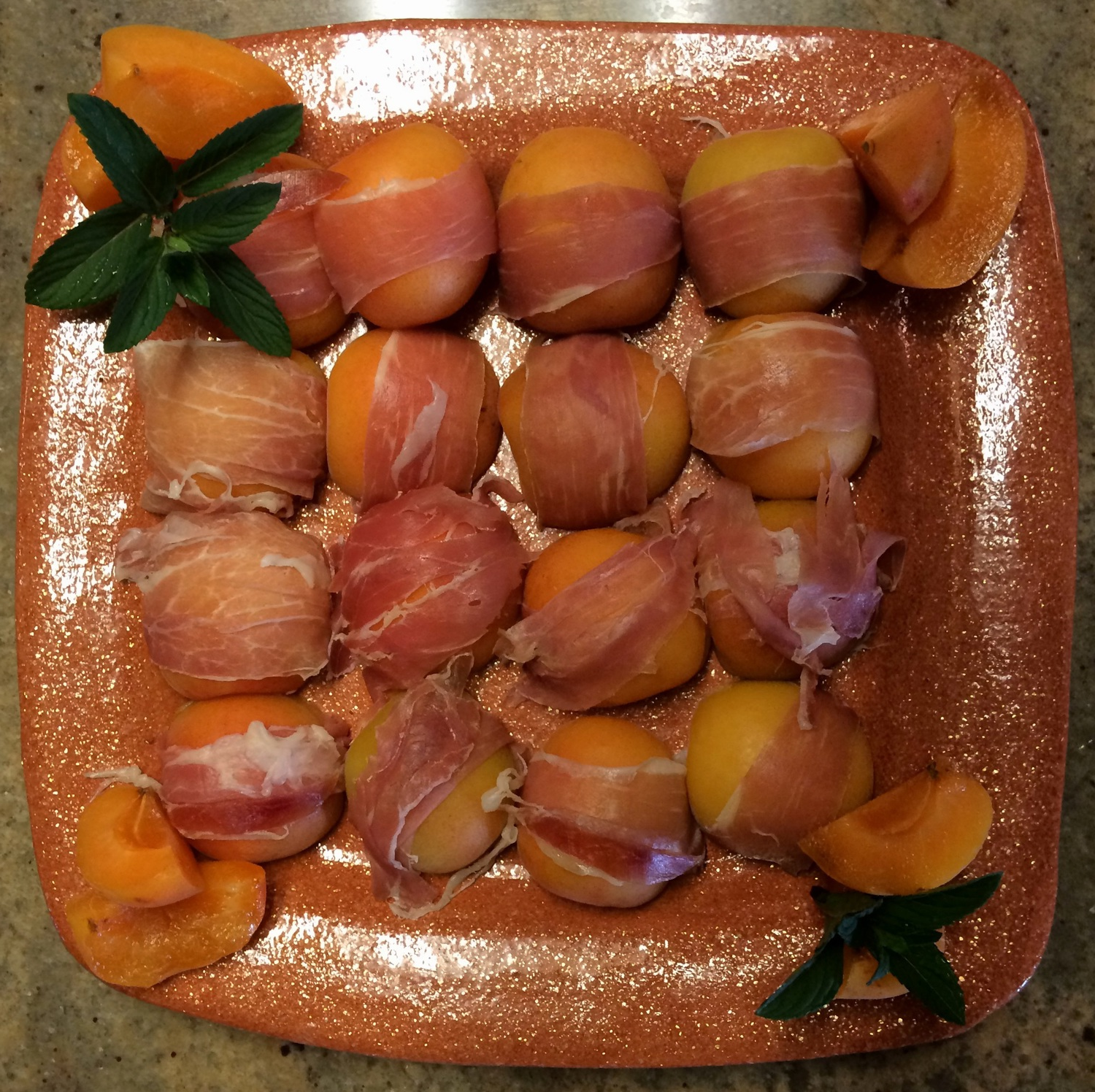 Freshly plated appetizers on a hand-made mica clay platter made by KlaybyKate .