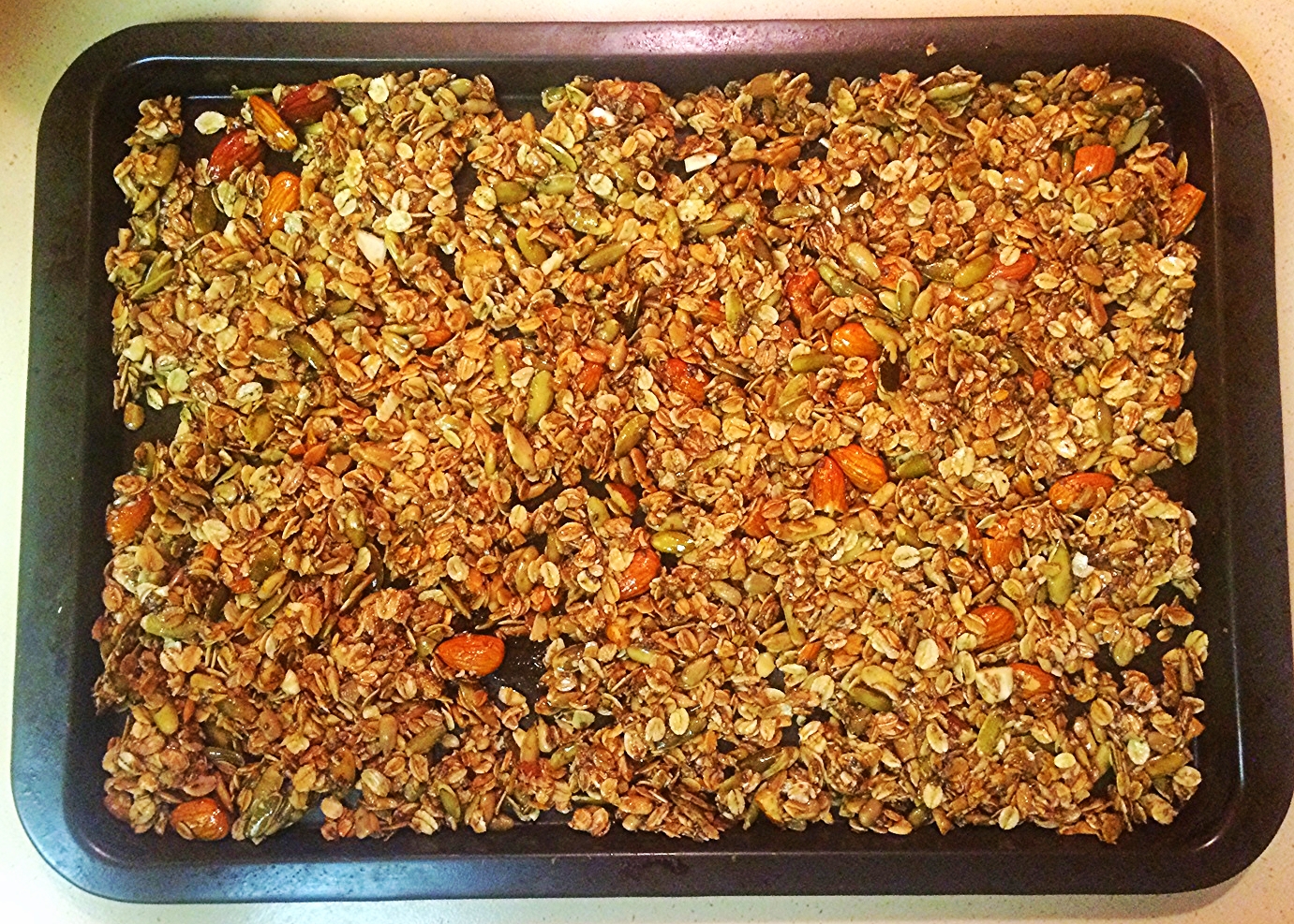 Raw granola mixture ready for the oven.
