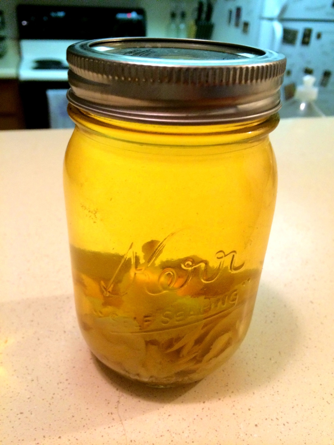 ...and same peel & vodka steep three weeks later. Notice the darker hue that tells you it is ready.