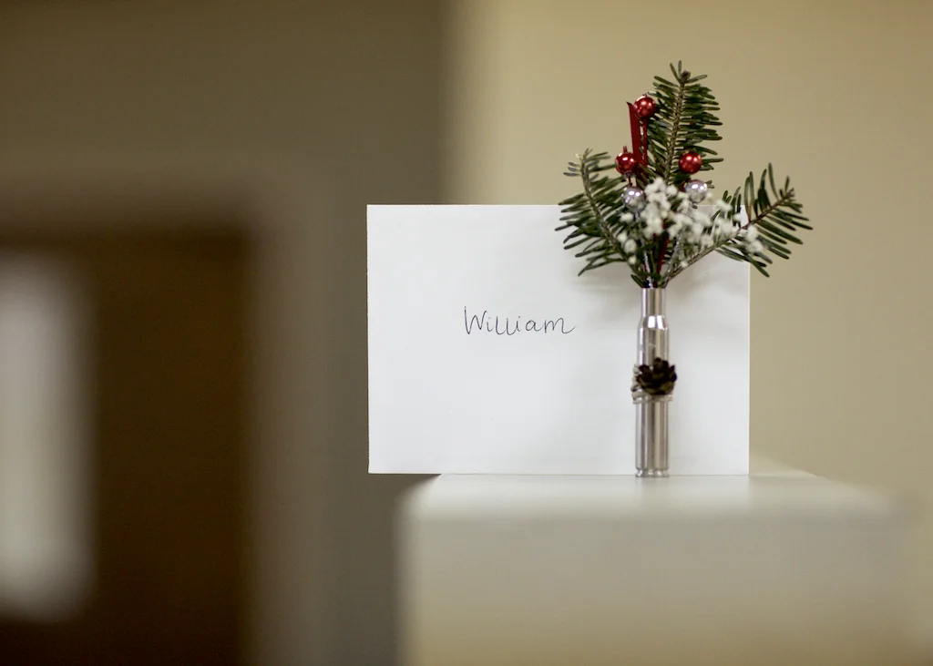 unique wedding boutonniere, christmas inspired boutonniere, boutonniere with holly berries