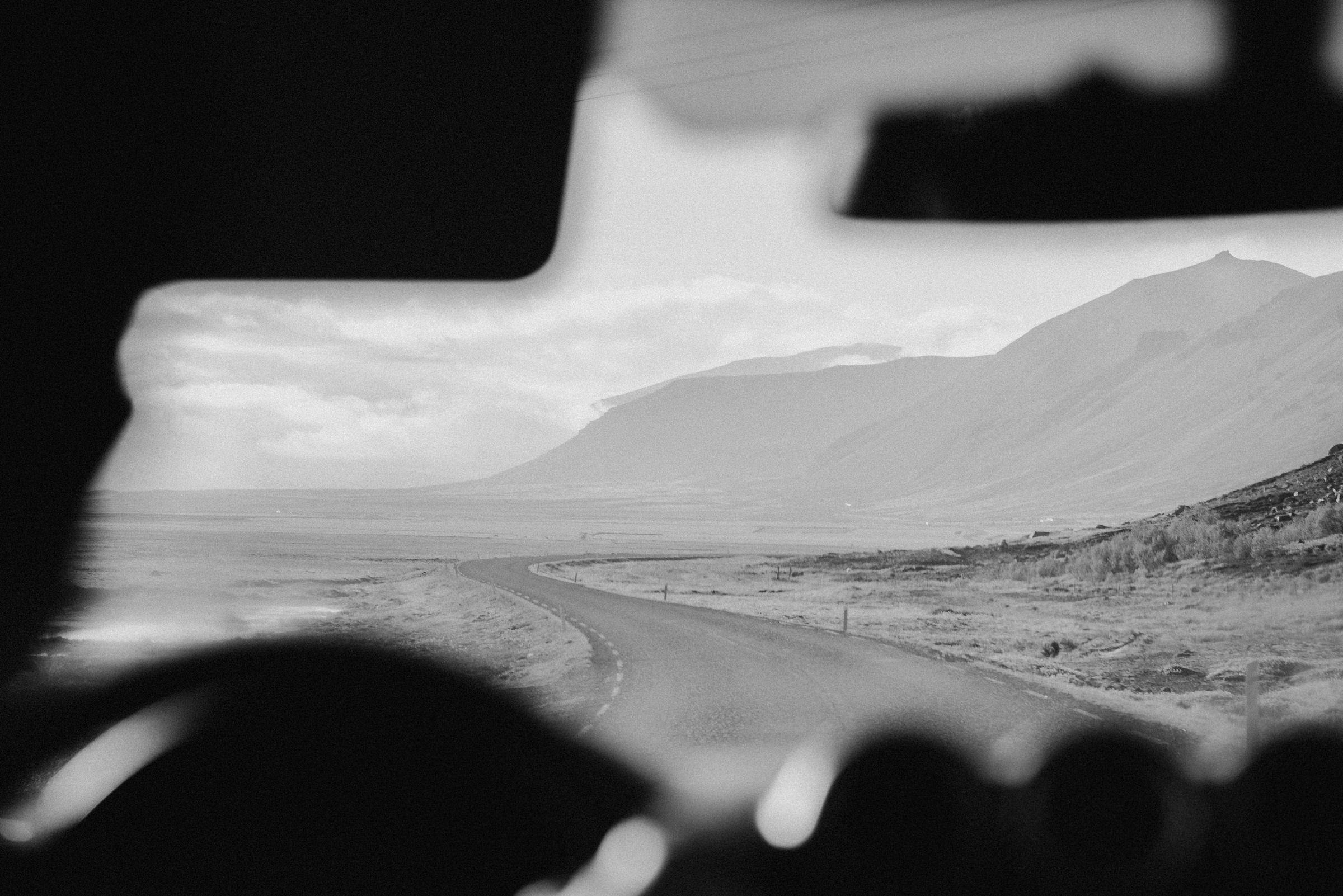 newlyweds driving in Iceland