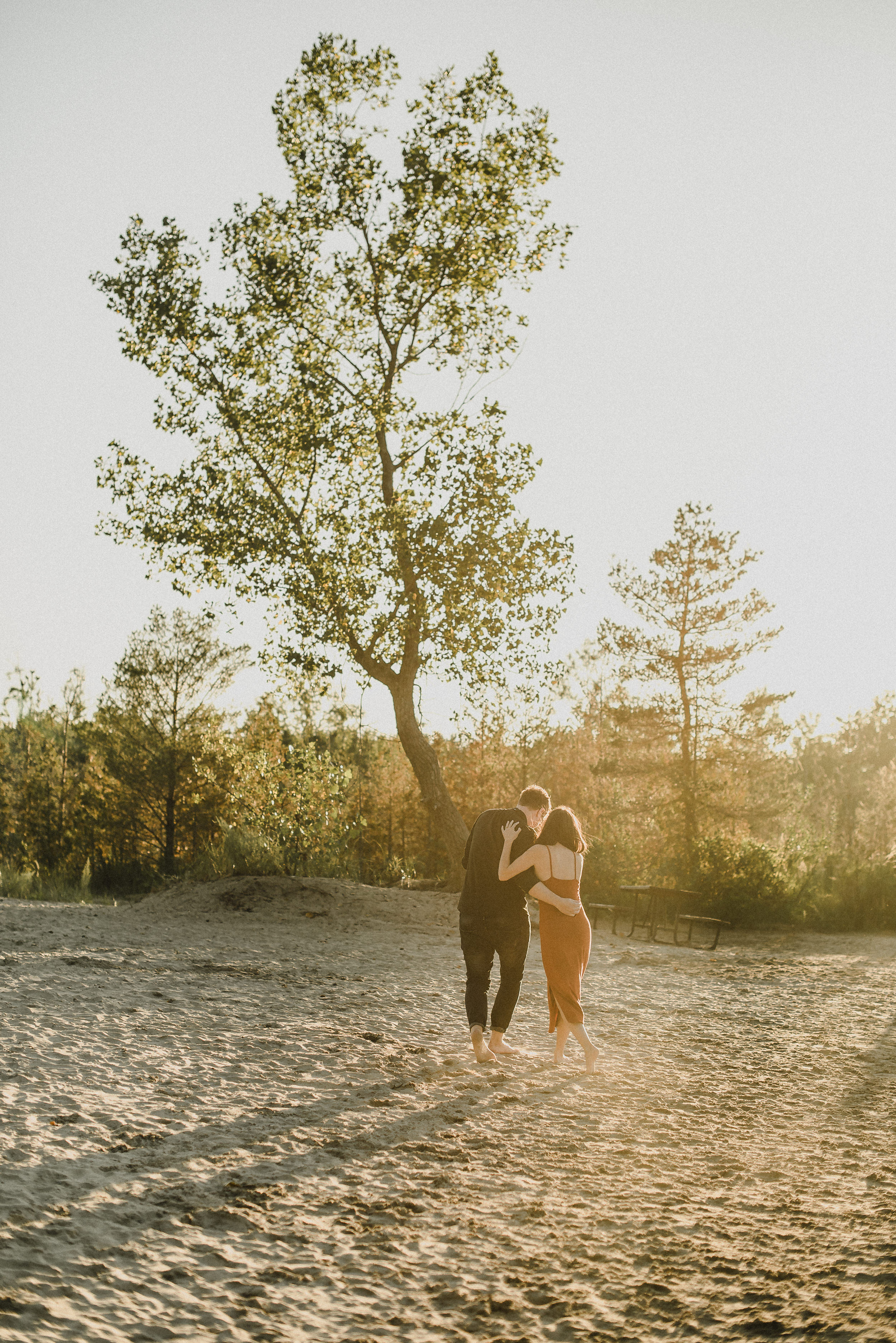 adventurous engagement session at sandbanks provincial park