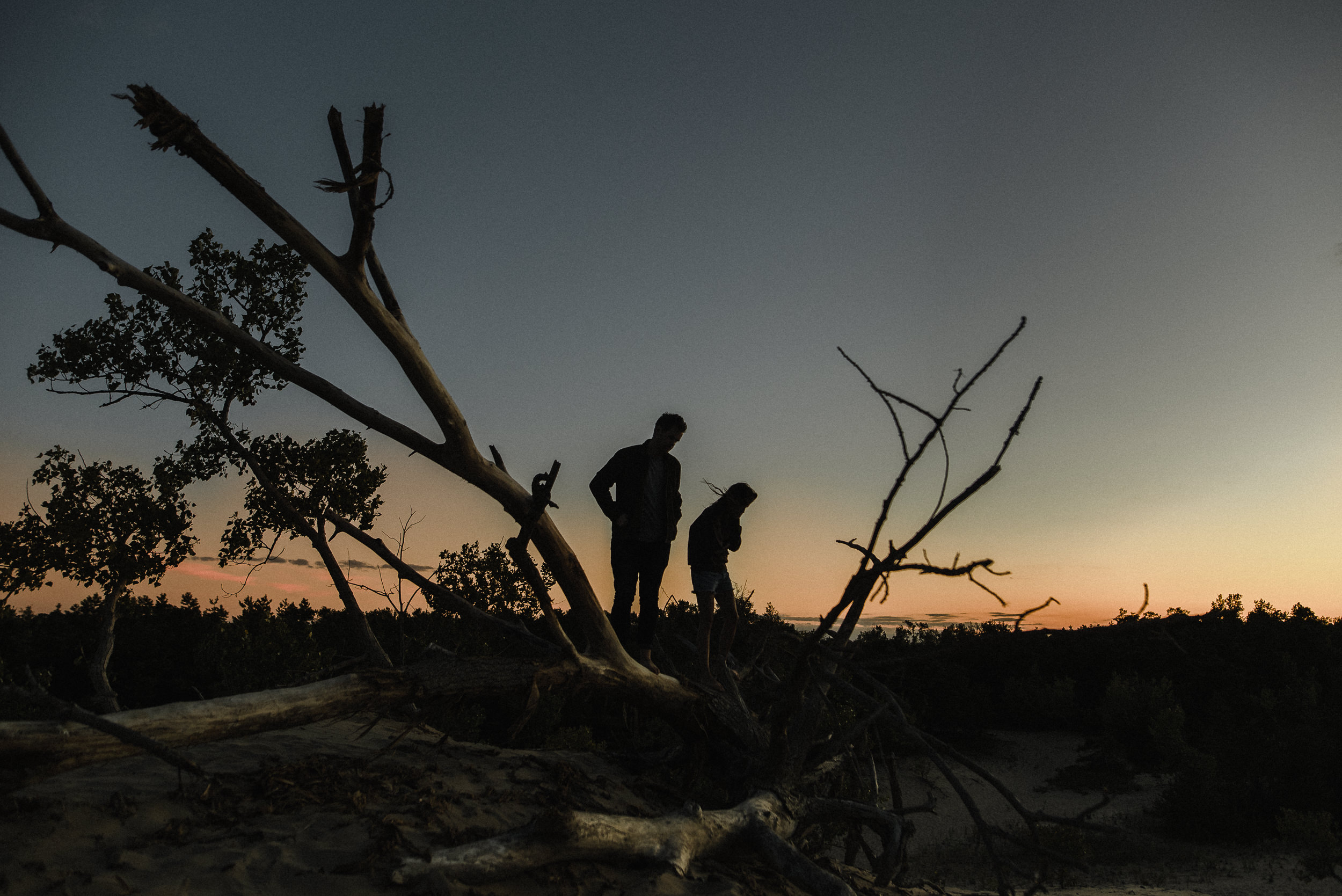sunset silhouette at romantic engagement session in PEC