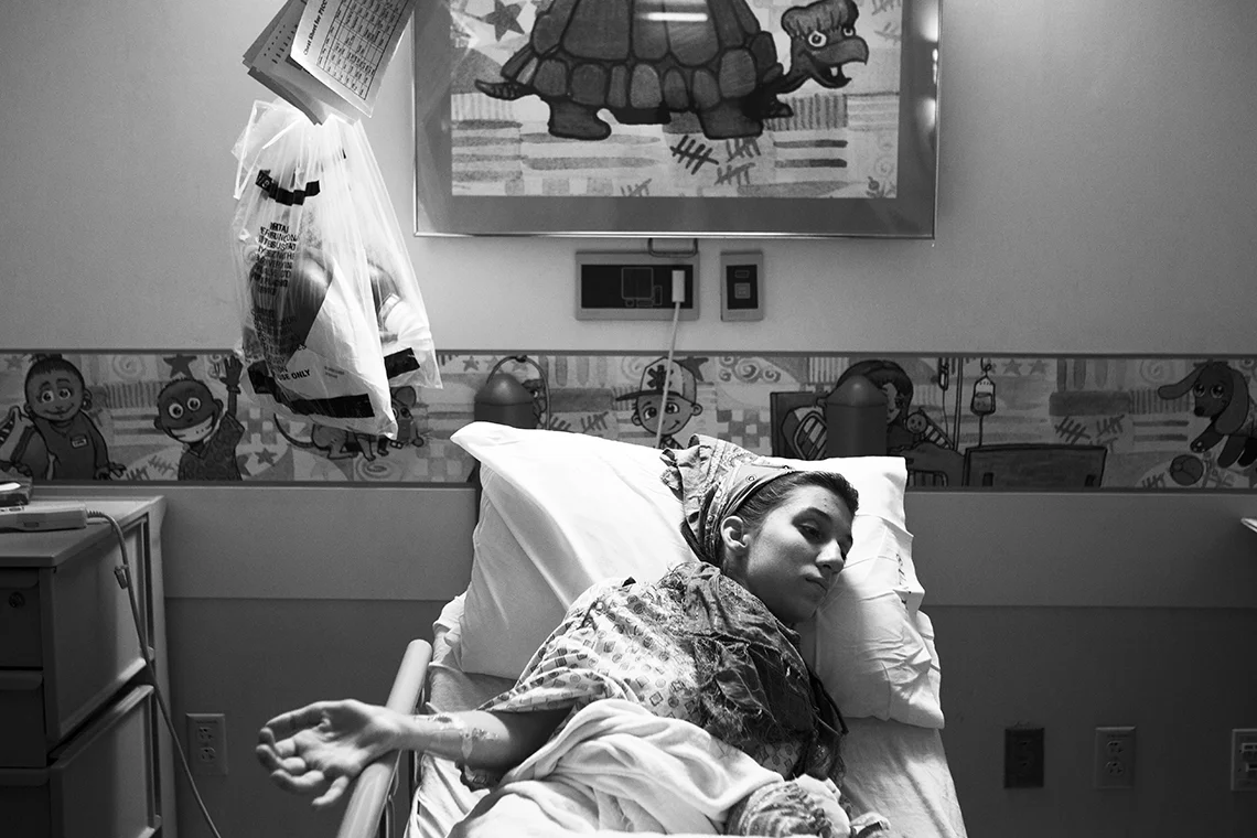  Gena waits to go into surgery. Gena says, "the hardest part about surgery isn’t the surgery itself, it's the raw fact that I have to start over ... that’s like a punch in the gut because you've built up all your strength, you’re happy and healthy an