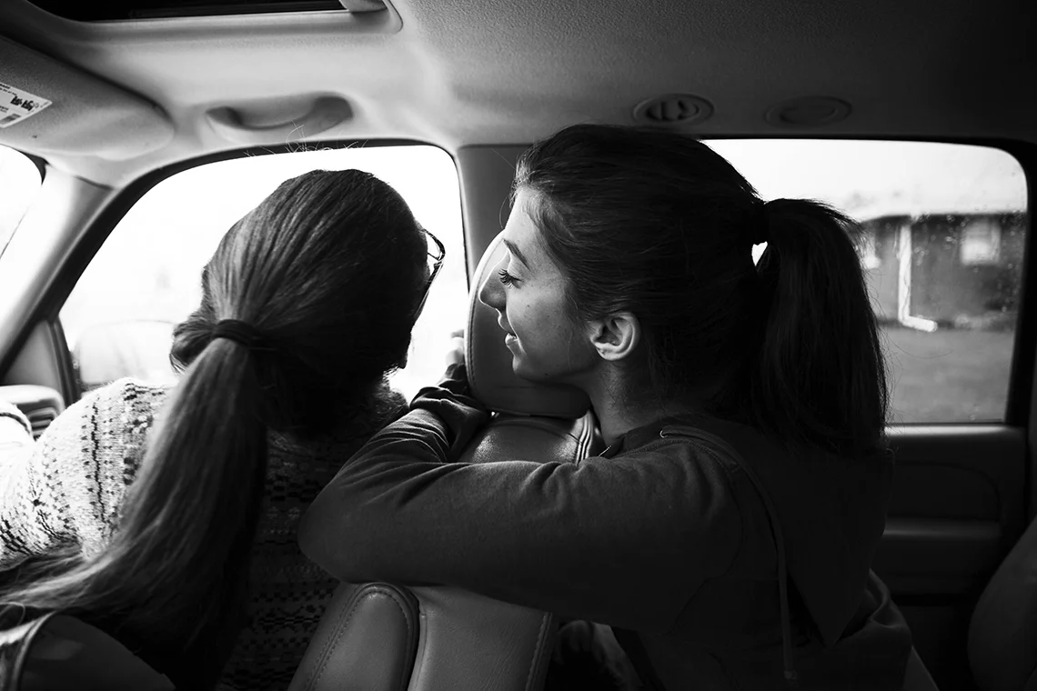  On the way to get her nails done for Junior Prom, Gena leans in to talk with Sophie about the school day.&nbsp; 