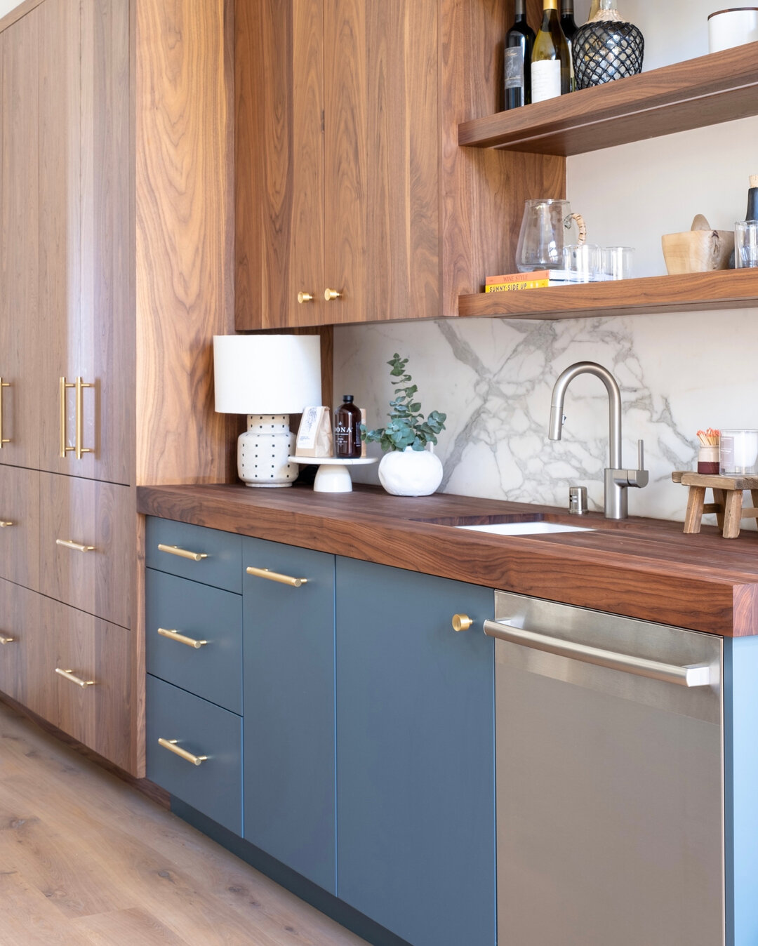 We&rsquo;re not afraid of mixed materials over here at GRD. This kitchen, primarily designed with walnut cabinetry, needed a pop of color and we came through with this cool blue creating the perfect spot for making cocktails and gathering with friend