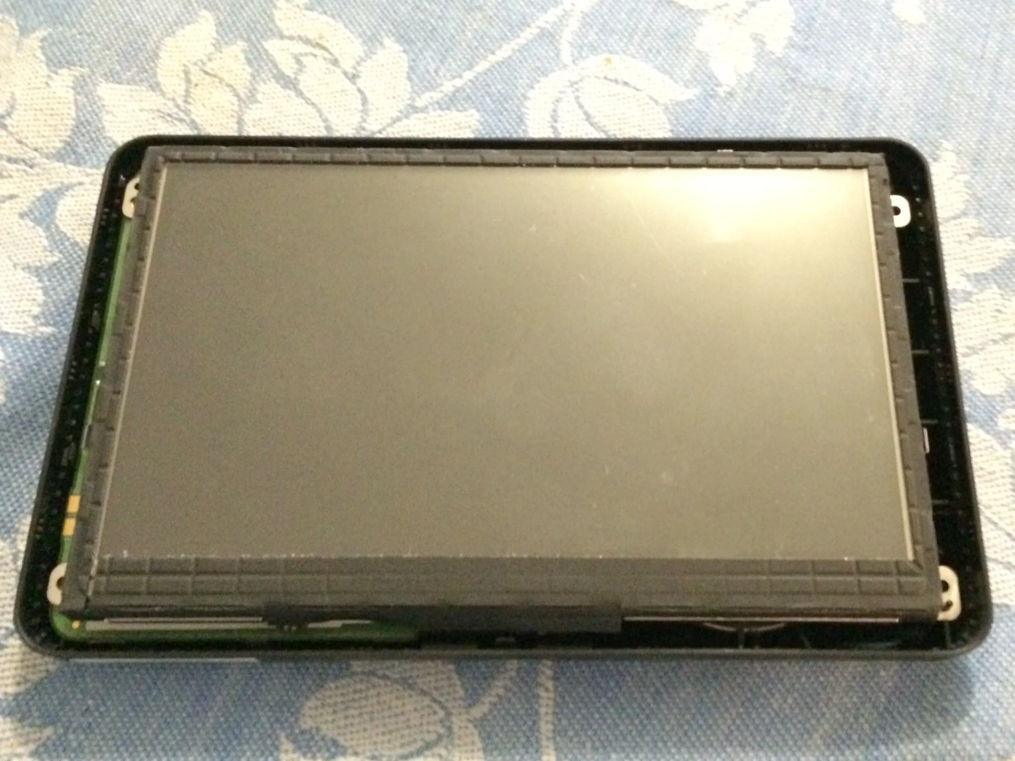 The Garmin without the front cover.