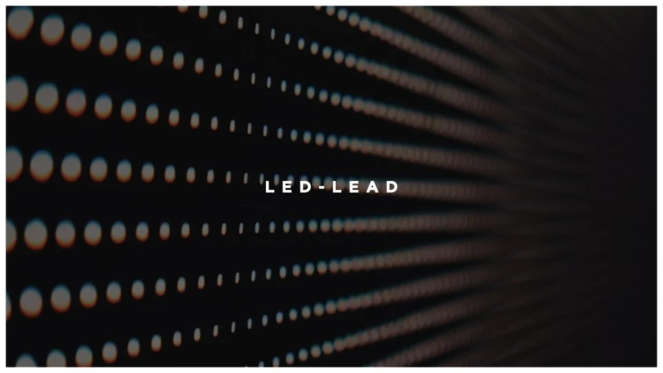 Digital LED lights creating a pattern with the text "LED-LEAD" in the center.