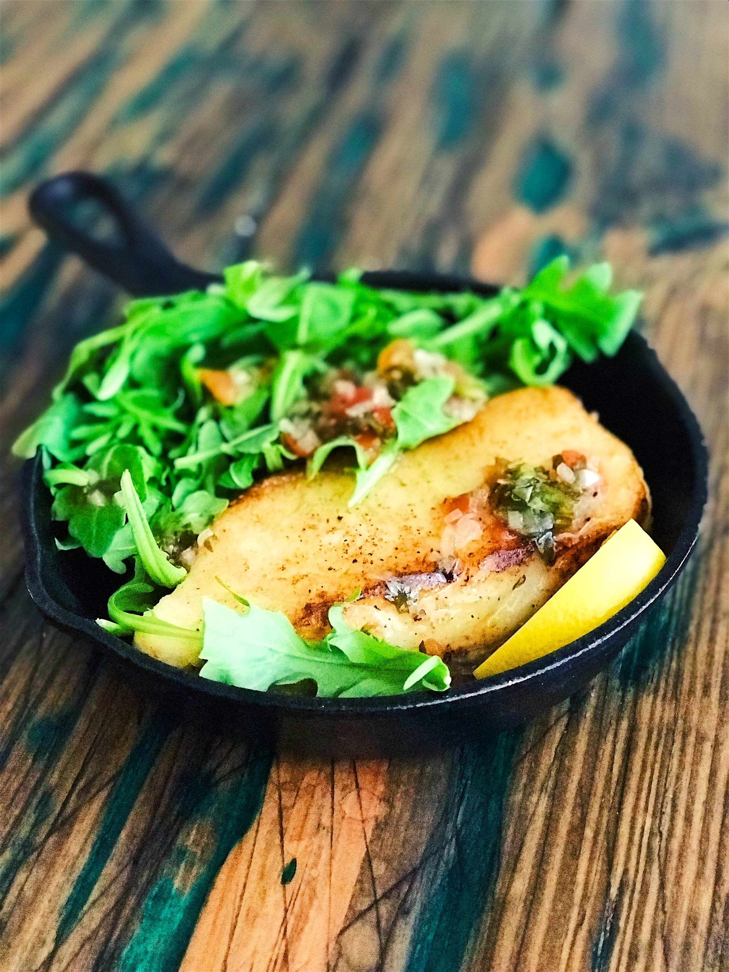Pan Seared Sea Bass with Arugula & Warm Vinaigrette