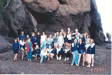 Standing on the Atlantic Ocean floor at low tide beside Hopewell Rock.