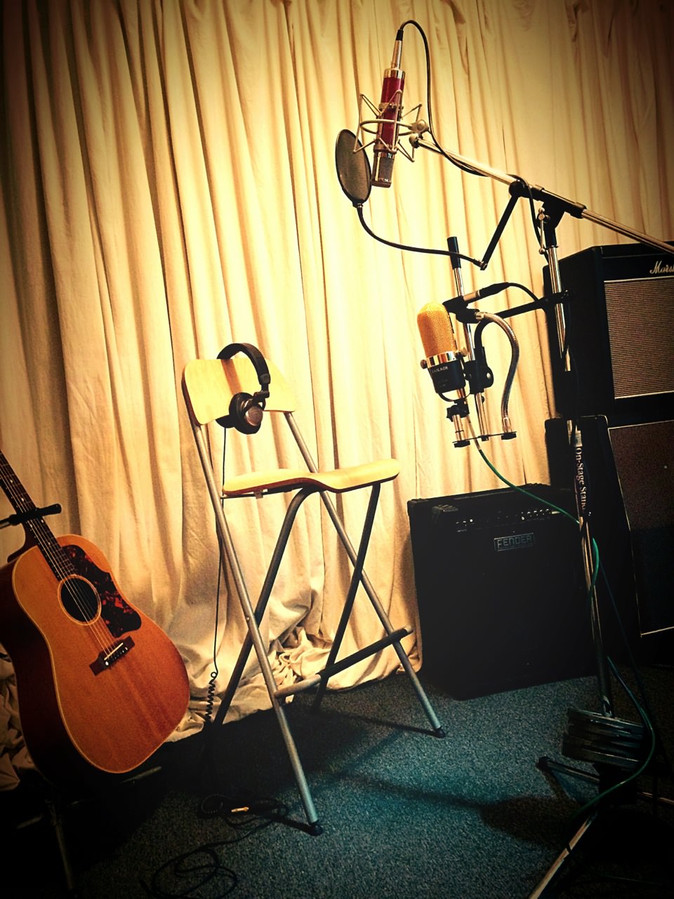 Live room setup: '57 Gibson J-50 acoustic. Avantone CV12 tube condenser on vocal. Victor ribbon & Michael Joly small diaphragm condenser mics for guitar.