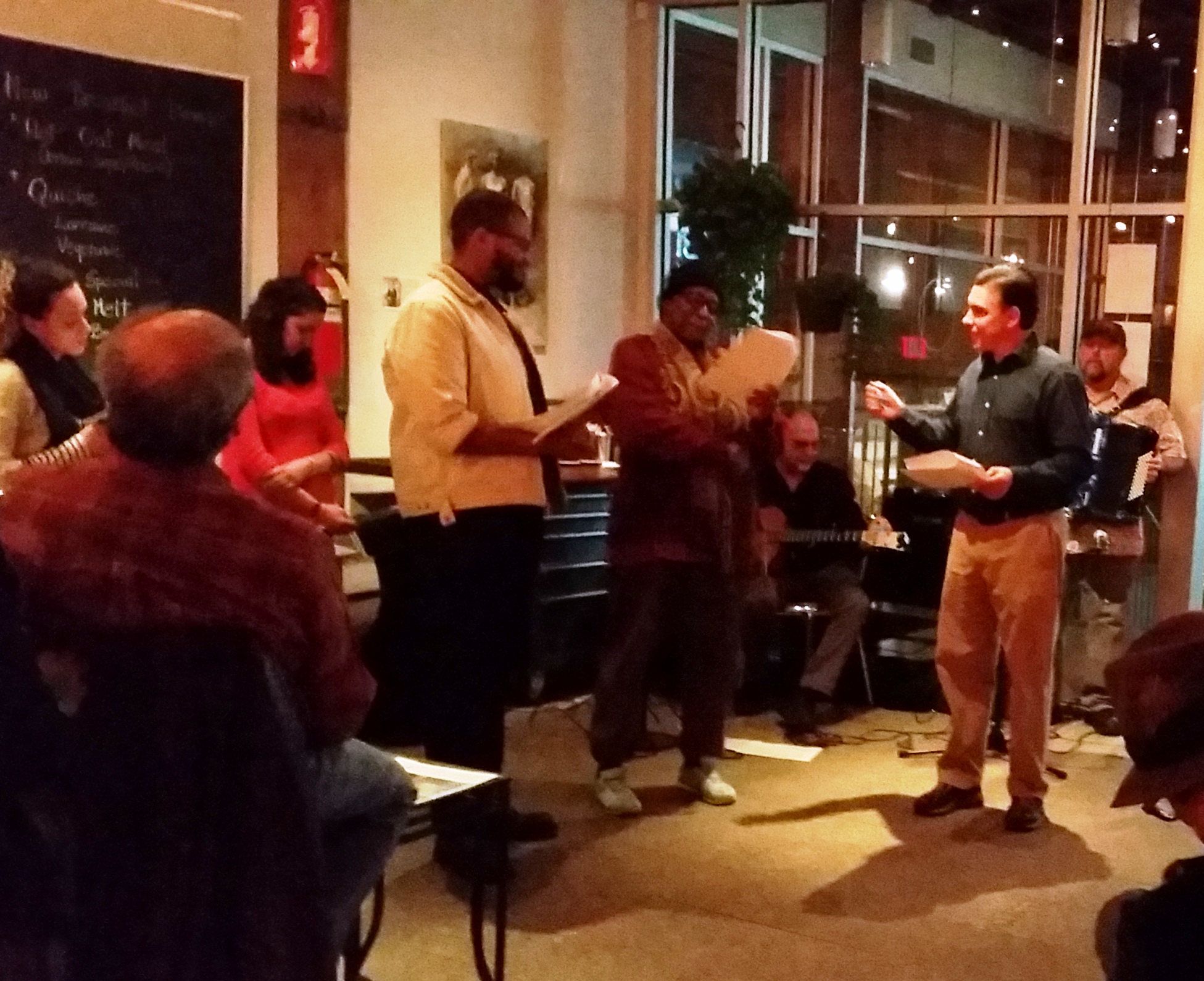 From left: Cristina Dones, Laura Edwards, Kendrick Terrell Evans, Sharon Squires, Larry Plitt (seated), Tom Kilgallen, and Ralph Tufo