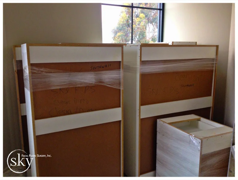 PHOTO: Three large pieces of cabinetry blocking a window.