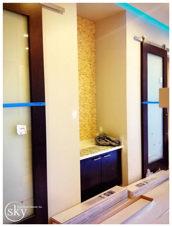 PHOTO: Honey onyx backdrop at handwashing station.