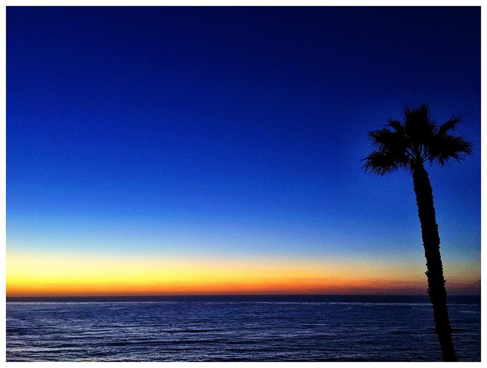 PHOTO: The sun setting over the ocean; view from San Diego Magazine's Woman of hte Year event in La Jolla.