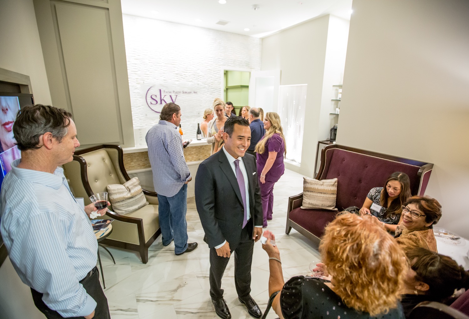 PHOTO: Named Best Cosmetic Surgeon, Dr. Yoo mingles with guests.