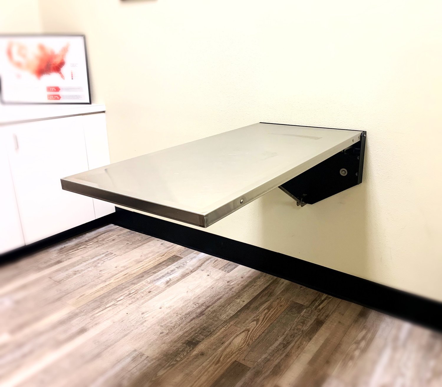 SOLD 500. 2018 VSSI Folding Wall Mount Exam Table 1 hour south of Houston — Used Vet Equipment