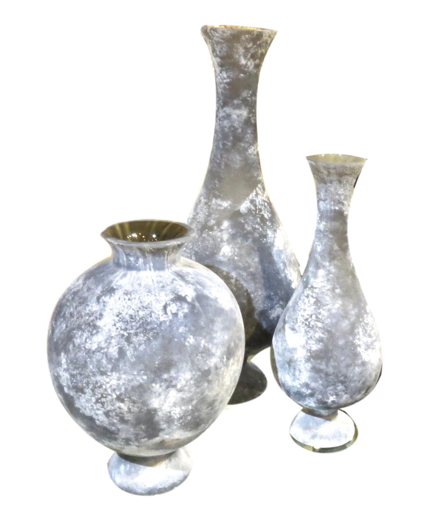 Gray Scavo Glass Vases 10.75"DIA. X 14.75"H GVRT7.30018 10.5"DIA. X 25.5"H GVRT7.30016 7.5"DIA. X 18.5"H GVRT7.30017
