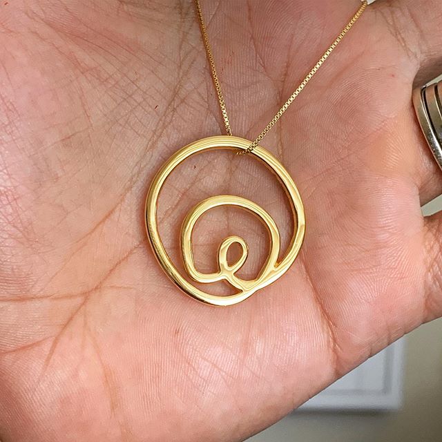 Love Full Circle Pendant by Sabet. This is one of my 5 Love symbols - love full circle is the word love created from one line - also expressing the self in the center loving the self! Available now on www.sabet.art