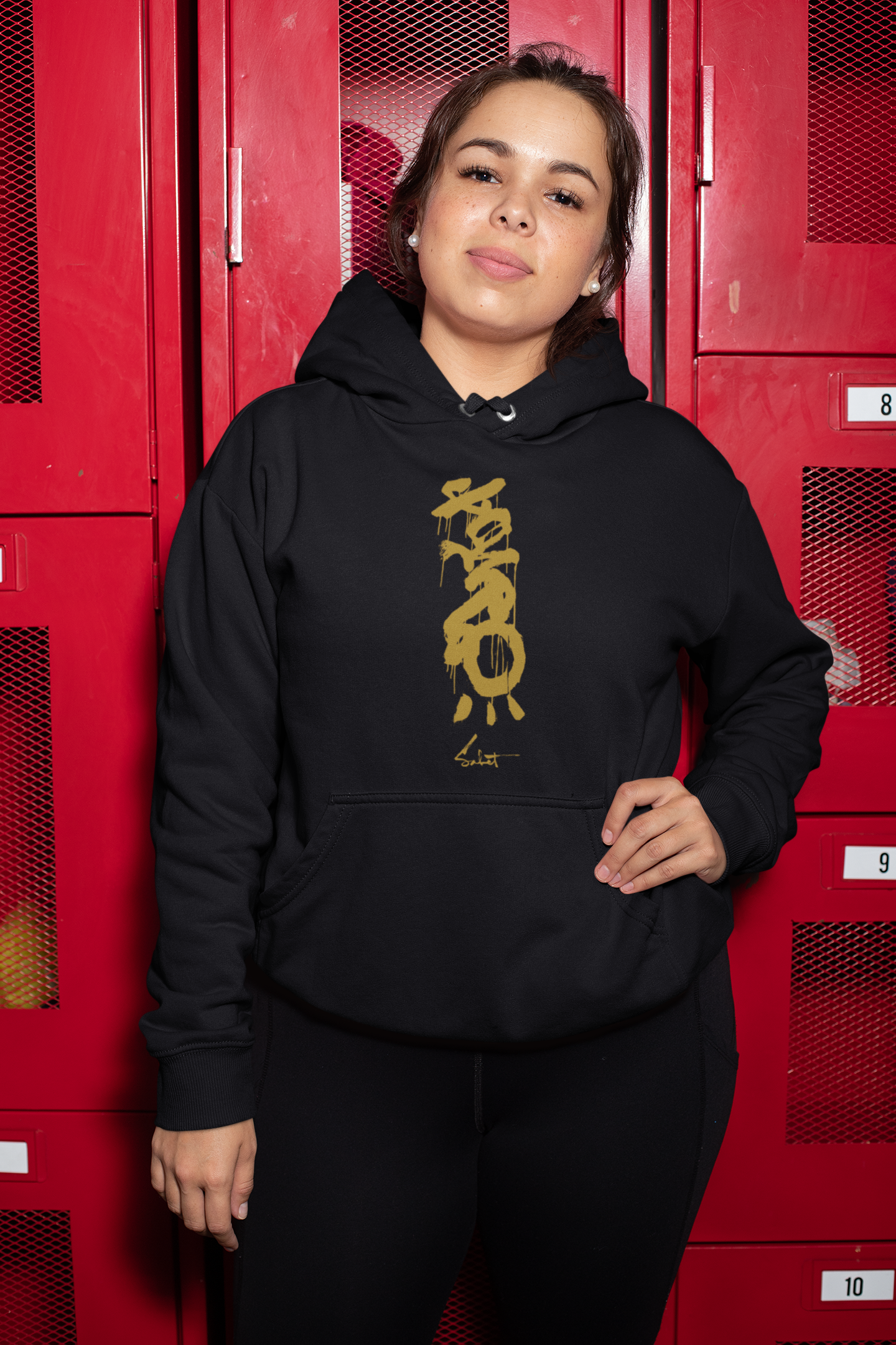 plus-size-hoodie-mockup-of-a-woman-posing-by-some-lockers-30152.png