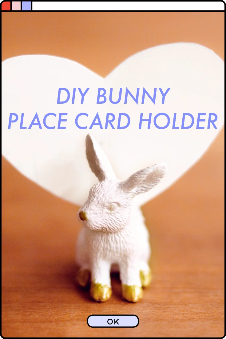 Make a cute animal place card holder using a rubber bunny toy and some gold accent paint for your next dinner party!