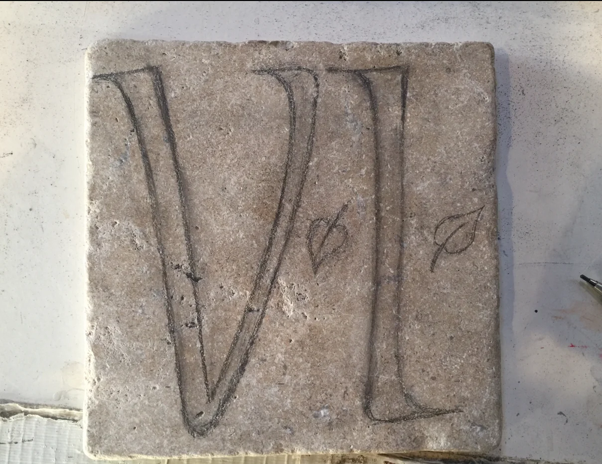 My rough sketch directly on the stone.